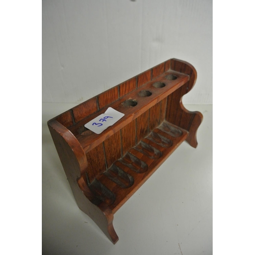 379 - A vintage pipe rack