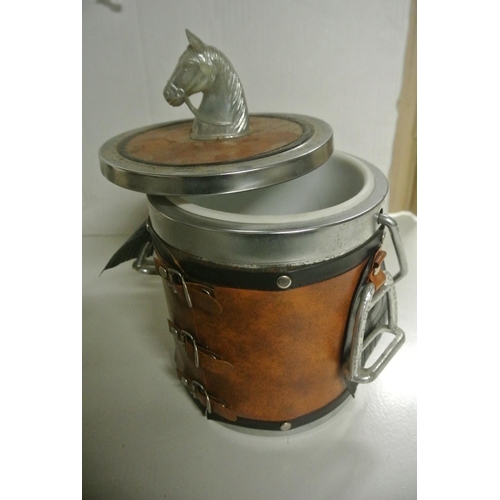 383 - A vintage ice bucket with leather coverings and horse details, along with two small dishes with equi... 