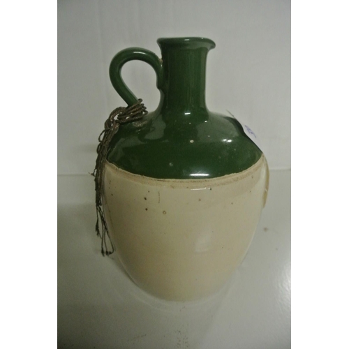 386 - A antique stoneware bottle reading 'Eau de Cologne'