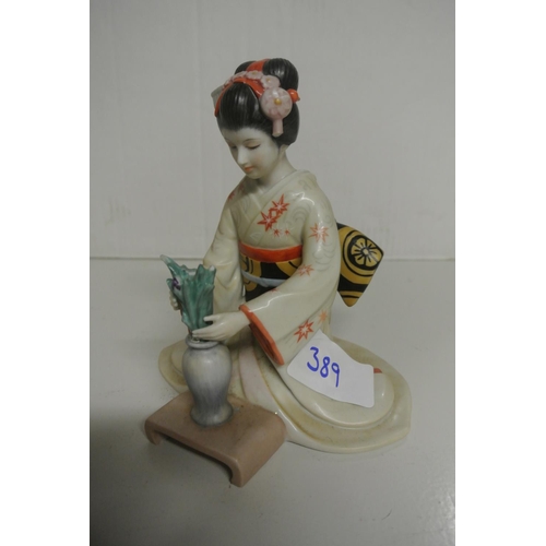 389 - A stunning fine porcelain figure of 'The Maiden of the Perfect Blossom' created by designer Tokutaro... 