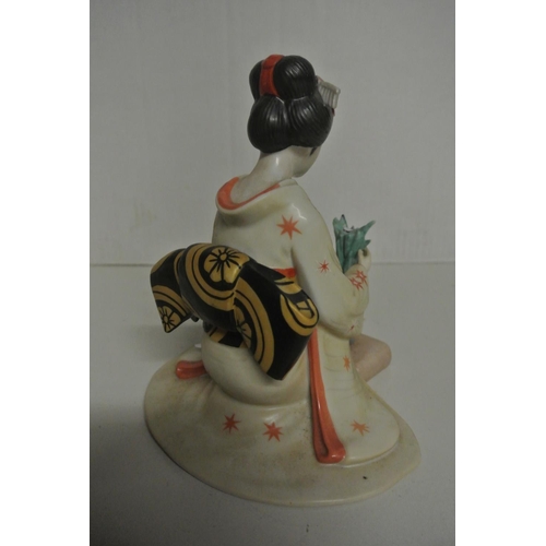 389 - A stunning fine porcelain figure of 'The Maiden of the Perfect Blossom' created by designer Tokutaro... 