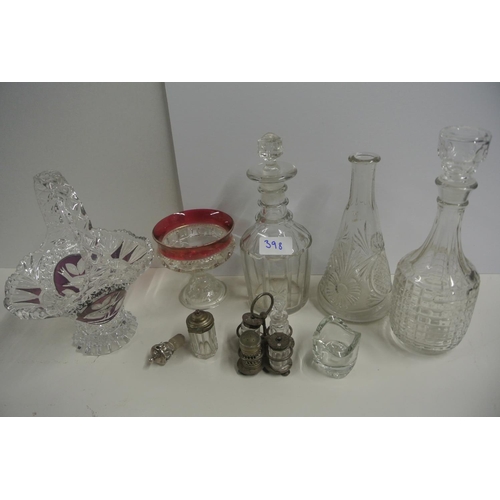 398 - A collection of glassware and crystal to include three vintage decanters and more