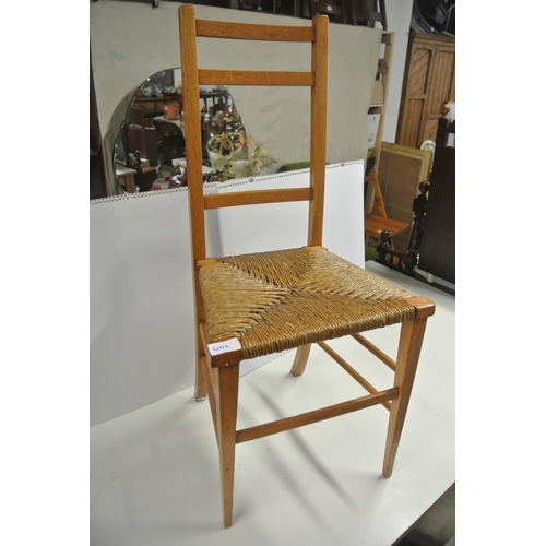 402 - An antique bedroom chair with woven seat