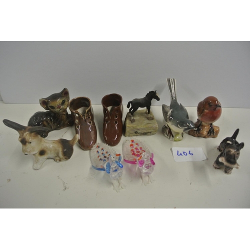 406 - An assortment of small ceramic figurines