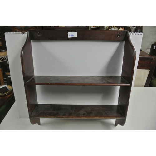 409 - An antique shelving unit.