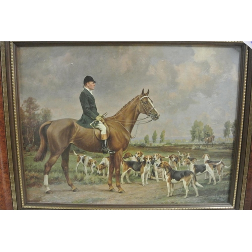 412 - A painting of a master of fox hounds in a beautifully detailed wooden frame