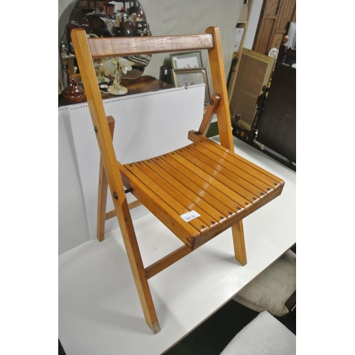 414 - A vintage folding wooden chair