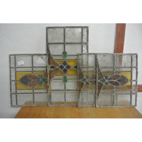 428 - A collection of antique stained glass windows (some a/f)