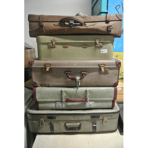 432 - A collection of five vintage suit cases / trunks