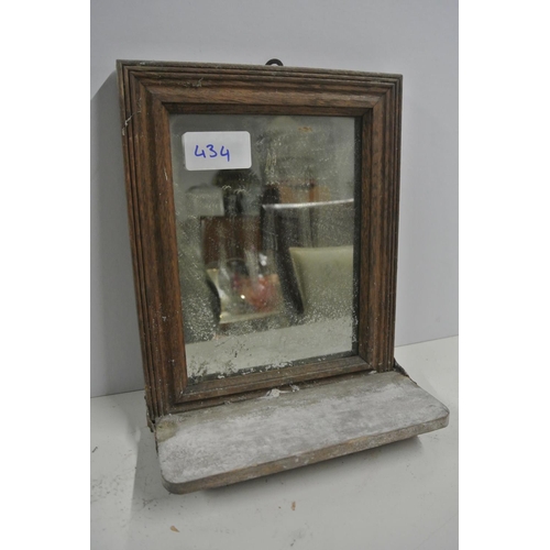 434 - An antique framed bathroom mirror with folding shelf