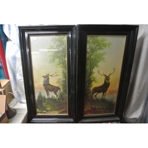 458 - A pair of paintings depicting stags in the wilderness in matching frames