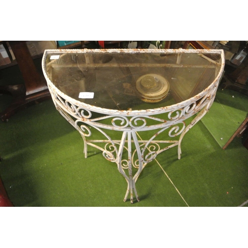 470 - A vintage half moon table with glass top