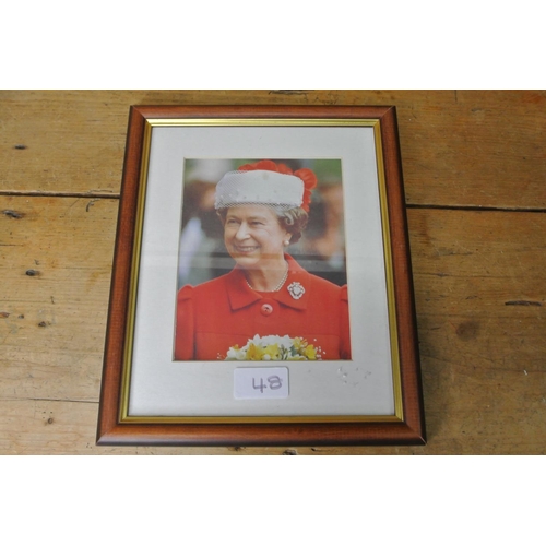 48 - A framed print 'Her Majesty the Queen'