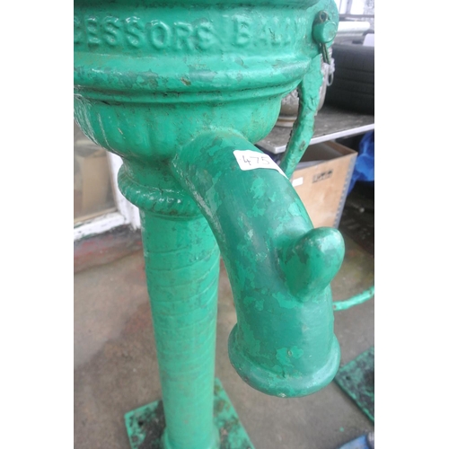 475 - An antique cast iron cow tail pump painted green, reading 'SUCCESSORS BALLYMENA'