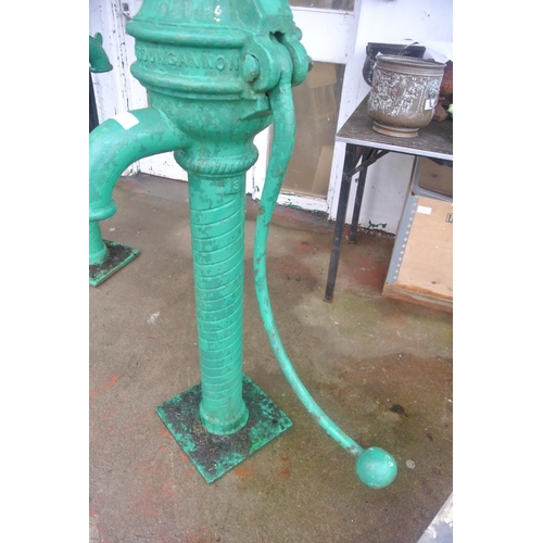 476 - A scarce antique cast iron cow tail pump painted green, reading 'WILSON GLASS DUNGANNON'