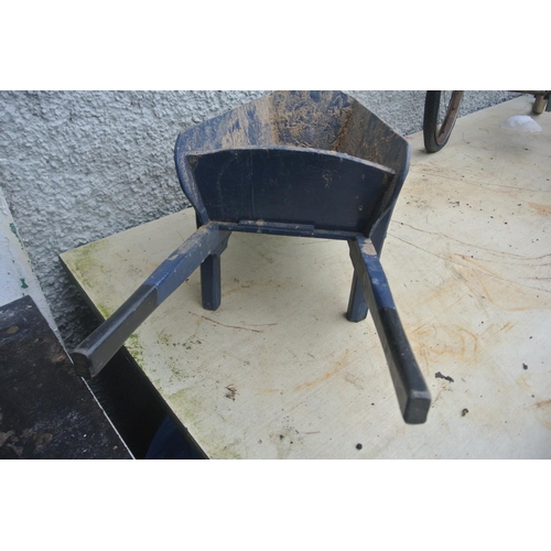 480 - A small wooden wheelbarrow