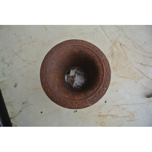 481 - An antique cast iron urn