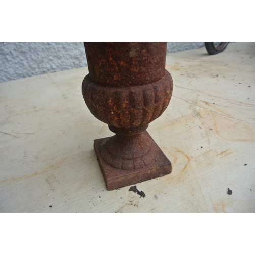 481 - An antique cast iron urn