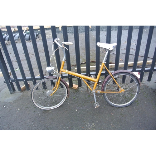 502 - A vintage Raleigh bicycle with carbide lamp.