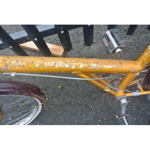 502 - A vintage Raleigh bicycle with carbide lamp.