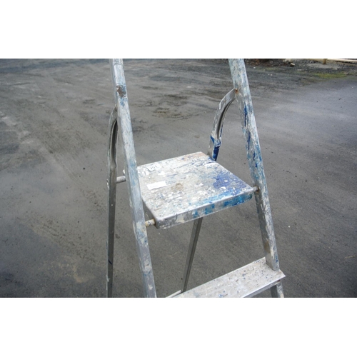 508 - A metal step ladder.