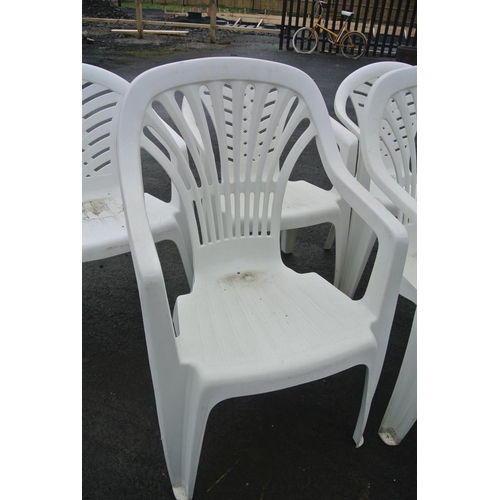 509 - A set of 6 plastic garden chairs.