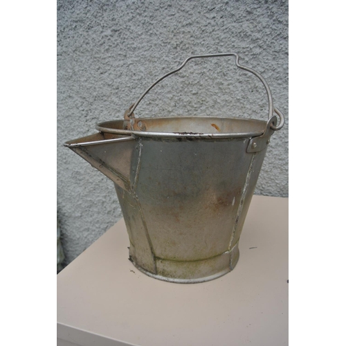 510 - A metal bucket.