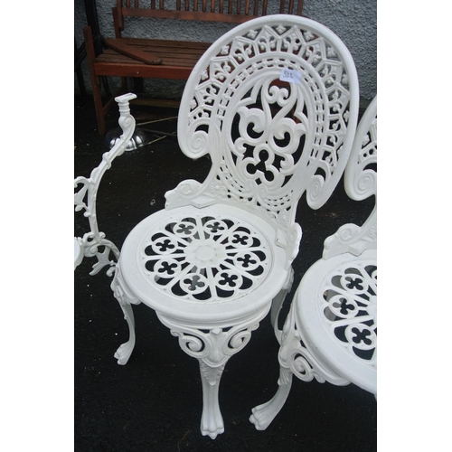 511 - A pair of metal garden chairs with matching table base.