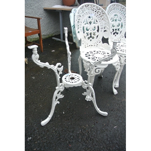 511 - A pair of metal garden chairs with matching table base.