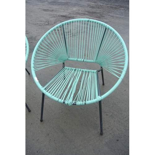 513 - Two modern woven garden chairs.