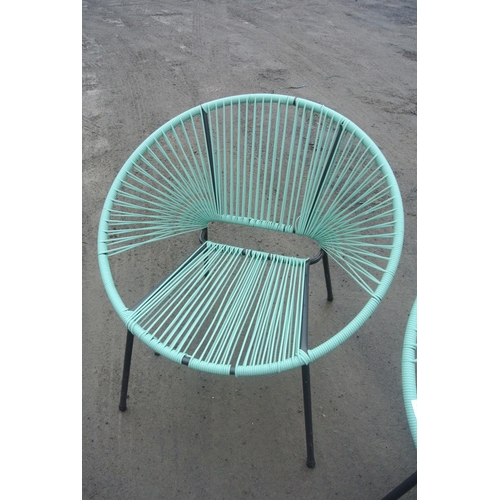 513 - Two modern woven garden chairs.