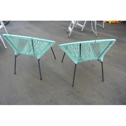 513 - Two modern woven garden chairs.