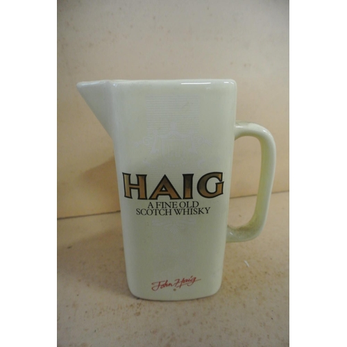 76 - A vintage Haig Whisky Pub advertising jug.