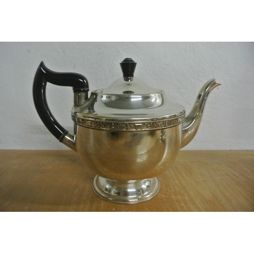 127 - An antique silver plated 4 piece tea service.