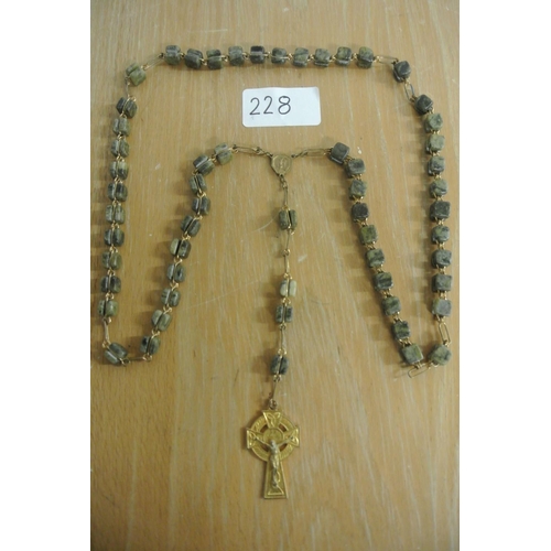 228 - A set of unusual Connemara marble rosary beads.