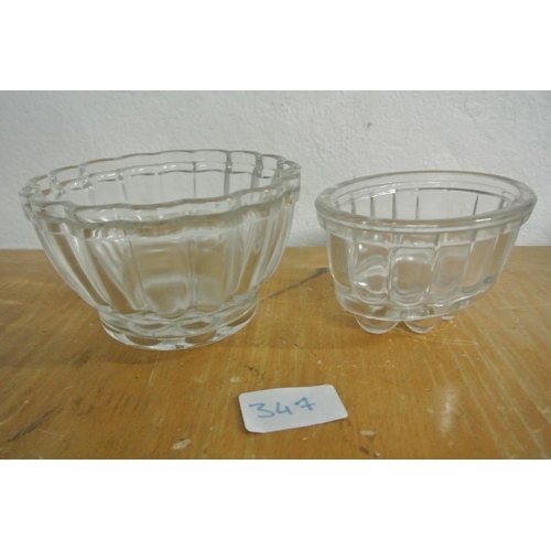 347 - A large collection of antique glassware and crystal items to include jelly moulds, butter dishes, gl... 