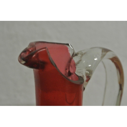 393 - A collection of antique and vintage ruby glass, to include a two stunning jugs and more (some a/f)