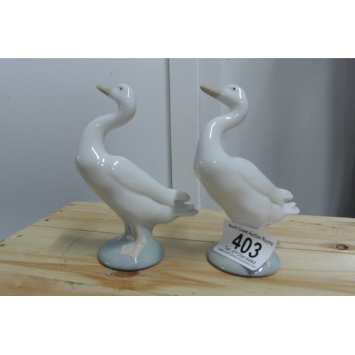 403 - A pair of Lladro ducks.