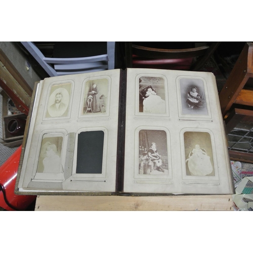 410 - An antique/ Victorian photo album with contents.