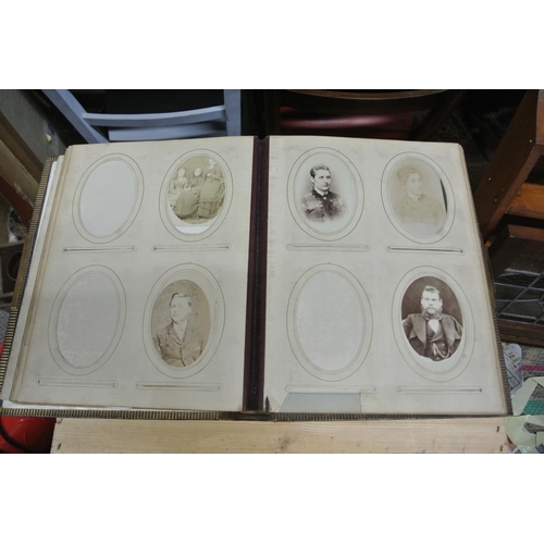 410 - An antique/ Victorian photo album with contents.