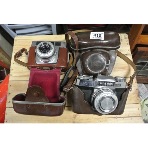 415 - 2 vintage Zeiss Ikon cameras in leather cases.