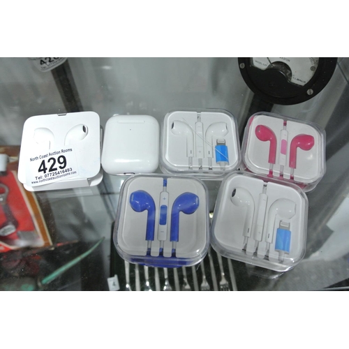 429 - An assortment of various headphones.