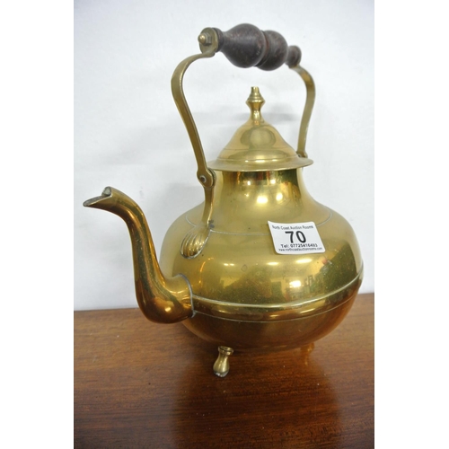 70 - An antique brass teapot along with a retro Picquot Ware teapot.