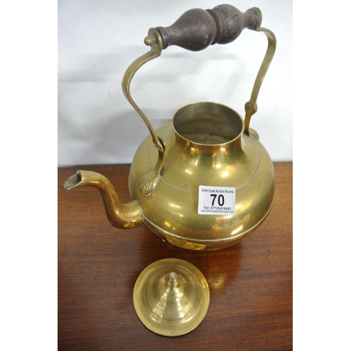 70 - An antique brass teapot along with a retro Picquot Ware teapot.