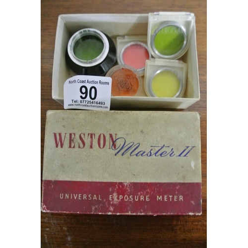 90 - A collection of antique / vintage coloured glass lenses produced by Ceneiplan and Nebro housed insid... 