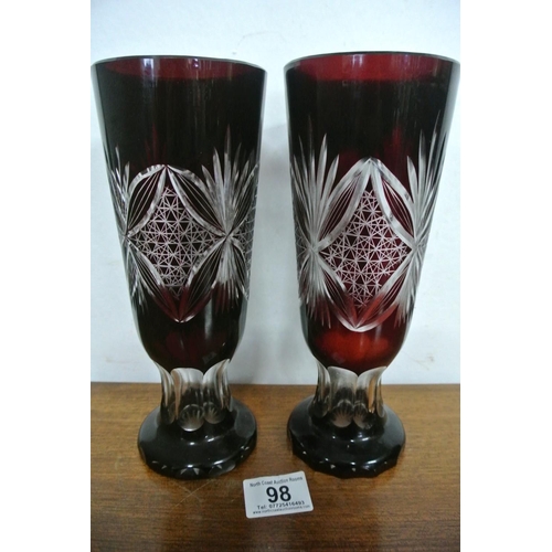 98 - A pair of vintage coloured and cut glass vases.