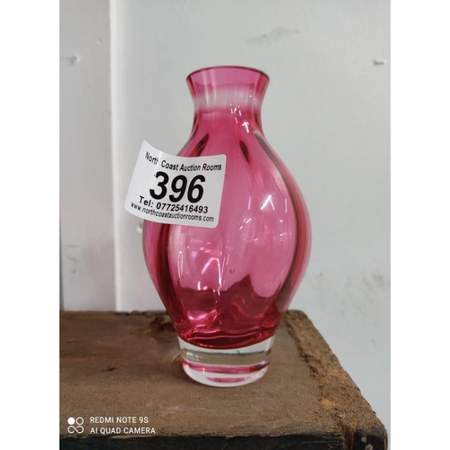 396 - A pink Dartington crystal vase.