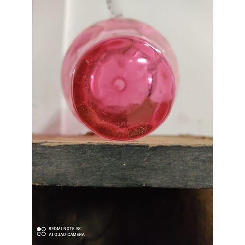 396 - A pink Dartington crystal vase.