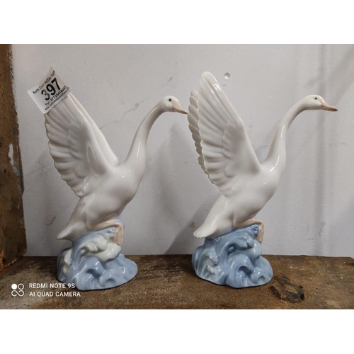 397 - A pair of Lladro Nao geese.