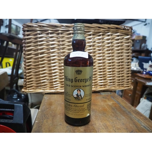 A vintage bottle of King George IV Extra Special Old Scotch A vintage bottle of King George IV Extra Special Old Scotch